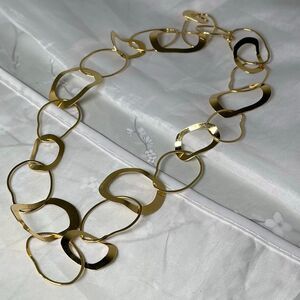 Delicate gold colored link necklace by Aura